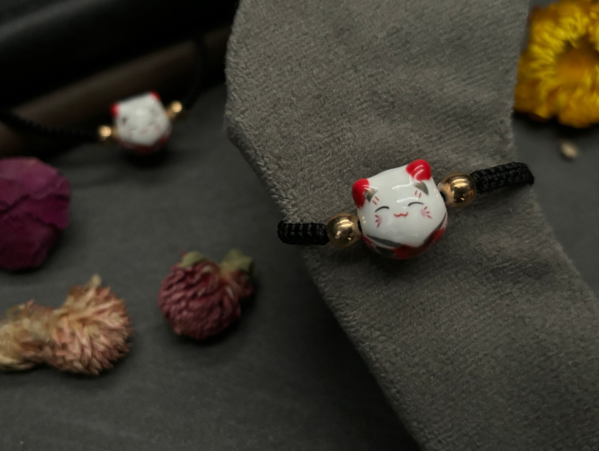 Red Maneki Neko "Lucky Cat" Bracelet (Twisted Nightshade Jewellery) close up