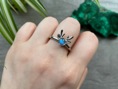 Pictured is a labradorite gemstone set in an S925 sterling silver ring. Labradorite Deer Ring - The Wandering Fox Emporium, Your Crystal Store