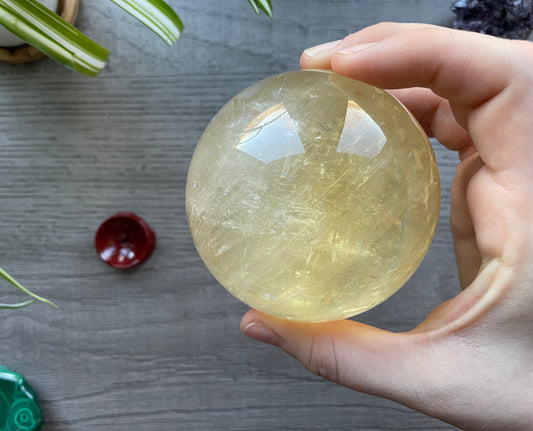 Honey Calcite Sphere - 76mm (B) - The Wandering Fox Emporium, Your Crystal Store